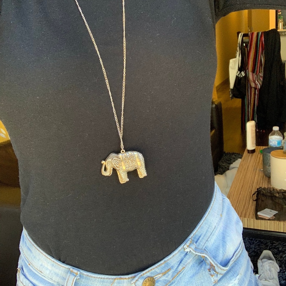 Gold elephant pendant necklace